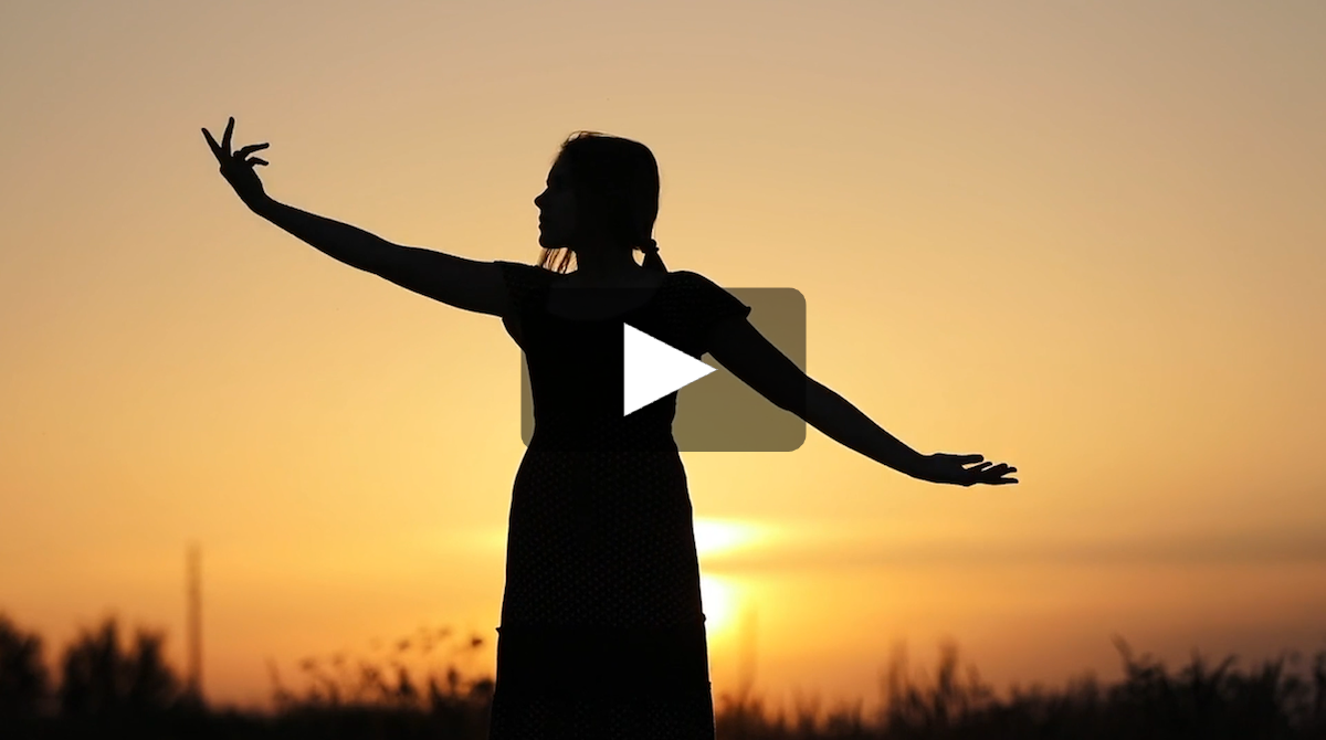 Video thumbnail showing person with arms outstretched in front of the sun